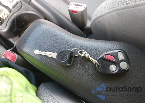 2000 Saturn Sc1 из США, поврежденный, VIN 1G8ZP1287YZ165587